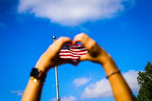 human hands and us flag